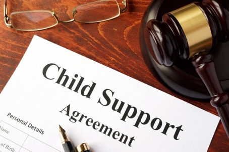 Child support agreement with a gavel