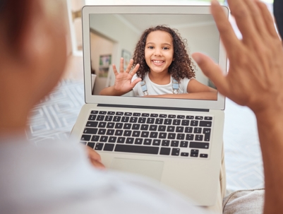 parent on video call with daughter